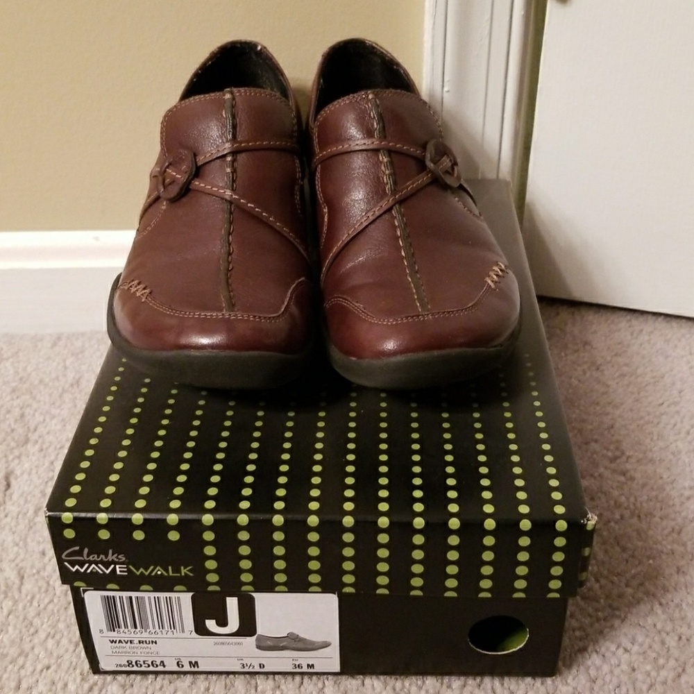 Clarks brown leather slip ons